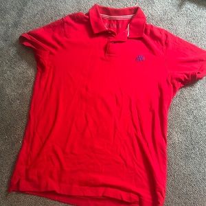 eropostale red polo t-shirt with blue logo.